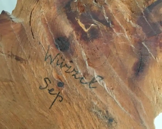 Carved old man signed