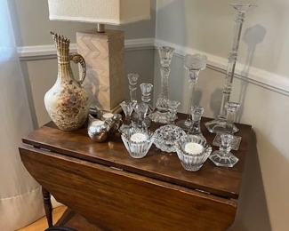 antique cart and crystal candlesticks