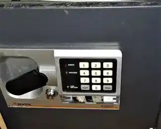 Sentry safe (with key and combination at cashier)