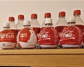 Vintage save the polar bears Coca Cola bottles