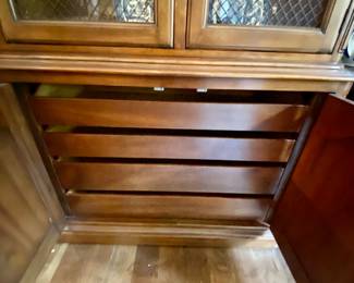 Storage under china cabinet