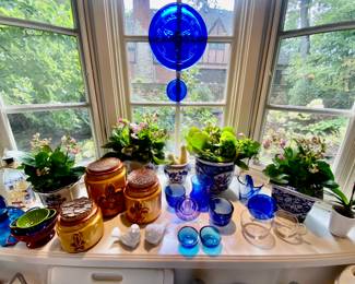 Kalanchoe plants in chinoiserie, ceramic canister set and cobalt blue glass accessories