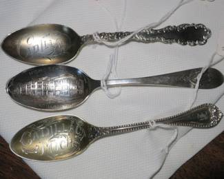 Sterling silver Cadillac MI spoons.