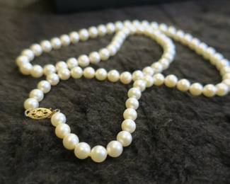 Many real pearl necklaces with 14k gold clasps. 