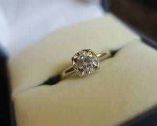 14k solitaire.33ct Glo setting 
