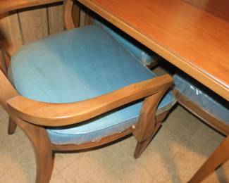 Plastic still on chairs 