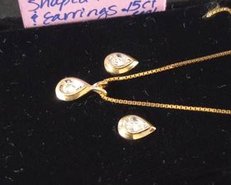 14k yellow gold pear shaped diamond necklace and earrings - .15ct each