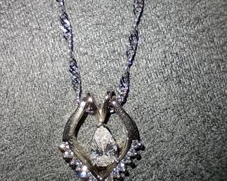 14k White Gold pear shaped pendant with diamonds