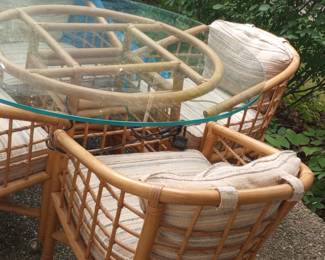 Nice! Glass & rattan patio/dining table with four chairs. 