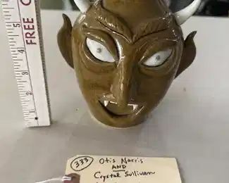 Otis Norris and Crystal Sulliva face jug devil vampire. 