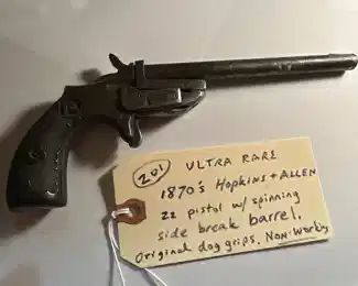 1870s rare Hopkins and Allen 22 pistol, barrel spins sideways to load.  Maybe a prototype. 