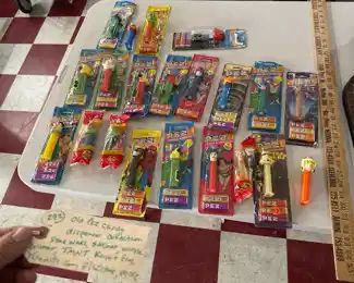 Large PEZ candy dispenser collection.  Batman Wonder Woman Kermit Frog, lots more