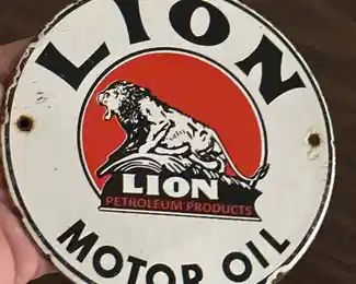 Lion motor oil porcelain gas pump sign