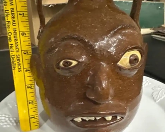 rare Charlie West face jug.  