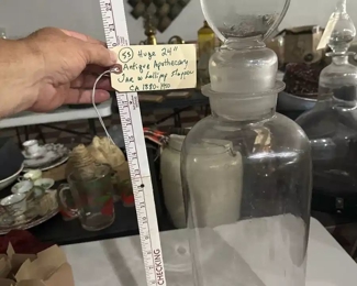 Huge antique apothecary drug store jar with lollipop stopper
