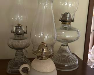 A small gathering of a great collection of oil lamps! 