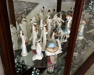 The curio is stuffed from top to bottom with GREAT Christmas fare! 