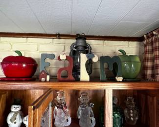This is a beautiful Oak Hoosier Cabinet with a porcelain  counter! AND a small peek at a large Snowman collection!