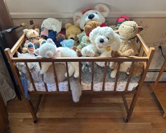 Beautiful Baby Crib filled with lots of great stuffed animals! 