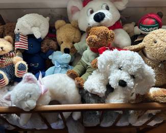 Beautiful Baby Crib filled with lots of great stuffed animals! 