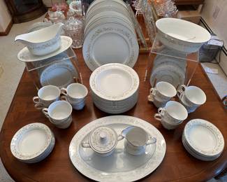 The dining room table is FILLED with fantastic vintage chine and glassware! Here you see a service fro 12 of  Sango China Dinnerware - "Debutante" Pattern 3688 