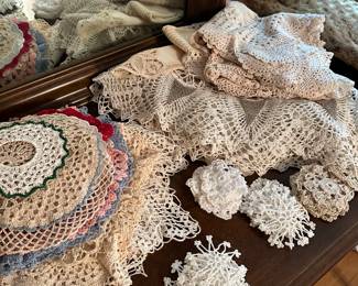 We have an ENTIRE room of Linens! Take a peak at the dozens of vintage doilies we have! The literally come in every shape and size. 