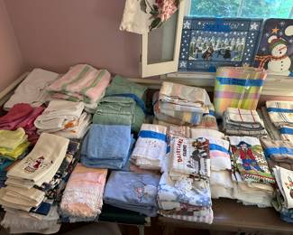 Here are several tables COVERED with Towels, washcloths, napkins, placemats and MORE! 