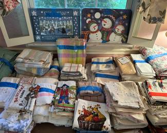 Here are several tables COVERED with Towels, washcloths, napkins, placemats and MORE! 