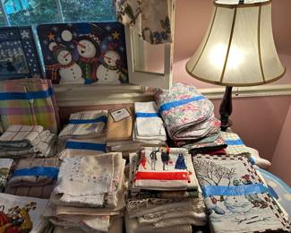 Here are several tables COVERED with Towels, washcloths, napkins, placemats and MORE! 