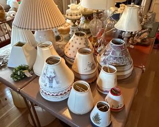 This is an electrifying picture of our collection of lamps! Lamps of ever sized shape and color! Vintage to contemporary, pairs to singles and LOTS of  lamp shades! 