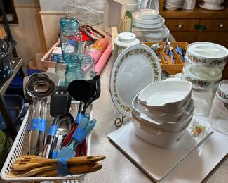 The kitchen island is a sea of great vintage kitchenware! 