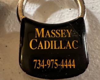 Fantastic collection of CADILLAC GOLD HOOD ORNAMENTS (MINT), Key Rings and Pocket Knife! 