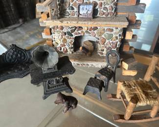 This is a miniature living room setup. Found in a dusty shoe box under the stairs in the barn! 