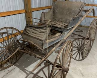 Here is an early 20th Century buggy that is in need of a lot of TLC. It is ripe for restoration! 