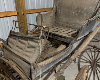 Here is an early 20th Century buggy that is in need of a lot of TLC. It is ripe for restoration! 