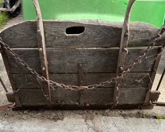 This is an antique snow plow to be pulled by a team of horses! 