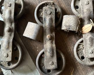 The fantastic antique rolling barn door hangers!