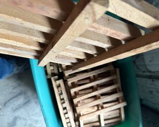 A large tote of interesting wooden grates - about 1’ x 1’ and are nailed. 
