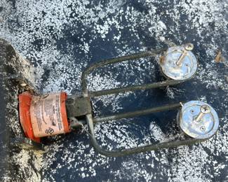 A Pair of rubbermaid 50 gallon stock tanks w/ water heaters.