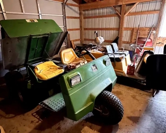 Three wheeled 1986 John Deere! AMT622! Next to it is a Harley Davison Cart!
