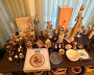 The dining room of the house has a table of higher end porcelain pieces! Hummel, Goebel, Lladro and more! Some sweet vintage items!
