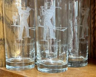 Several different types of cups and glasses with Golf Motiff!