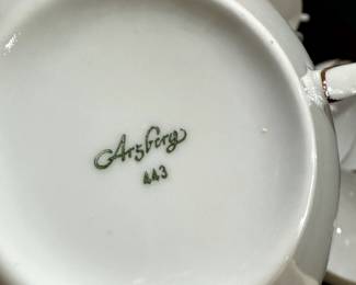 This is a service for 13! Arsberg plates and interesting bowls/cups with handles on both ends!