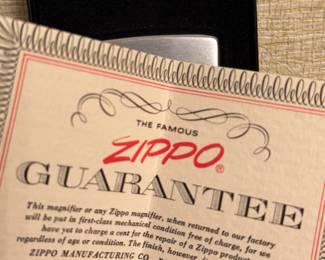 A fantastic Vintage Zippo MAGnifier! Mint in the original package! The Stalwart Rubber Company Advertisement!