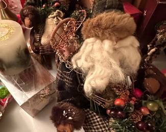 Here is a close-up of two Woodland Santas riding on their sleighs!