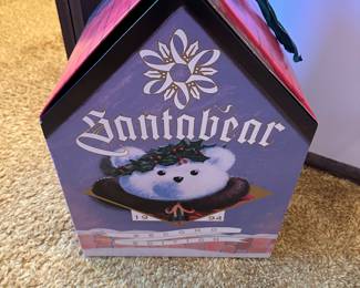 This Santa Bear has his own house!