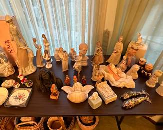 The dining room of the house has a table of higher end porcelain pieces! Hummel, Goebel, Lladro and more! Some sweet vintage items!