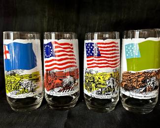 We have the complete set of EIGHT Coca-Cola Heritage FLAG Glasses and the Pitcher. Here are the first four glasses!