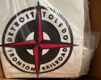 This sale has provided us with one surprise after another! This box does NOT disappoint. It is a box of UNOPENED VINTAGE RAILROAD COMPANY T-SHIRTS! There are MULTIPLE of each shirt!