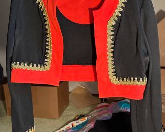 The sale has DOZENS of pieces of Vintage Clothing from ALL periods! Short Bolero Jacket with gold trim.